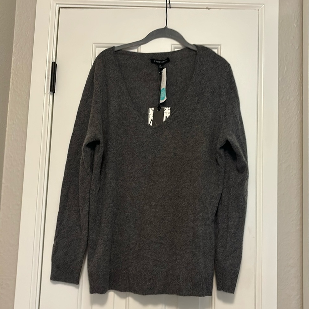 41 Hawthorn brand in size large. Dark gray in color.